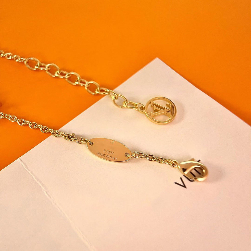 LOUIS VUITTON LOGO STAR MOTIF GOLD BRACELET